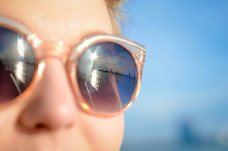 a photo of a person wearing sunglasses on summer holiday